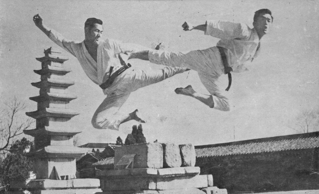 black & white pic of flying kicks in taekwon-do